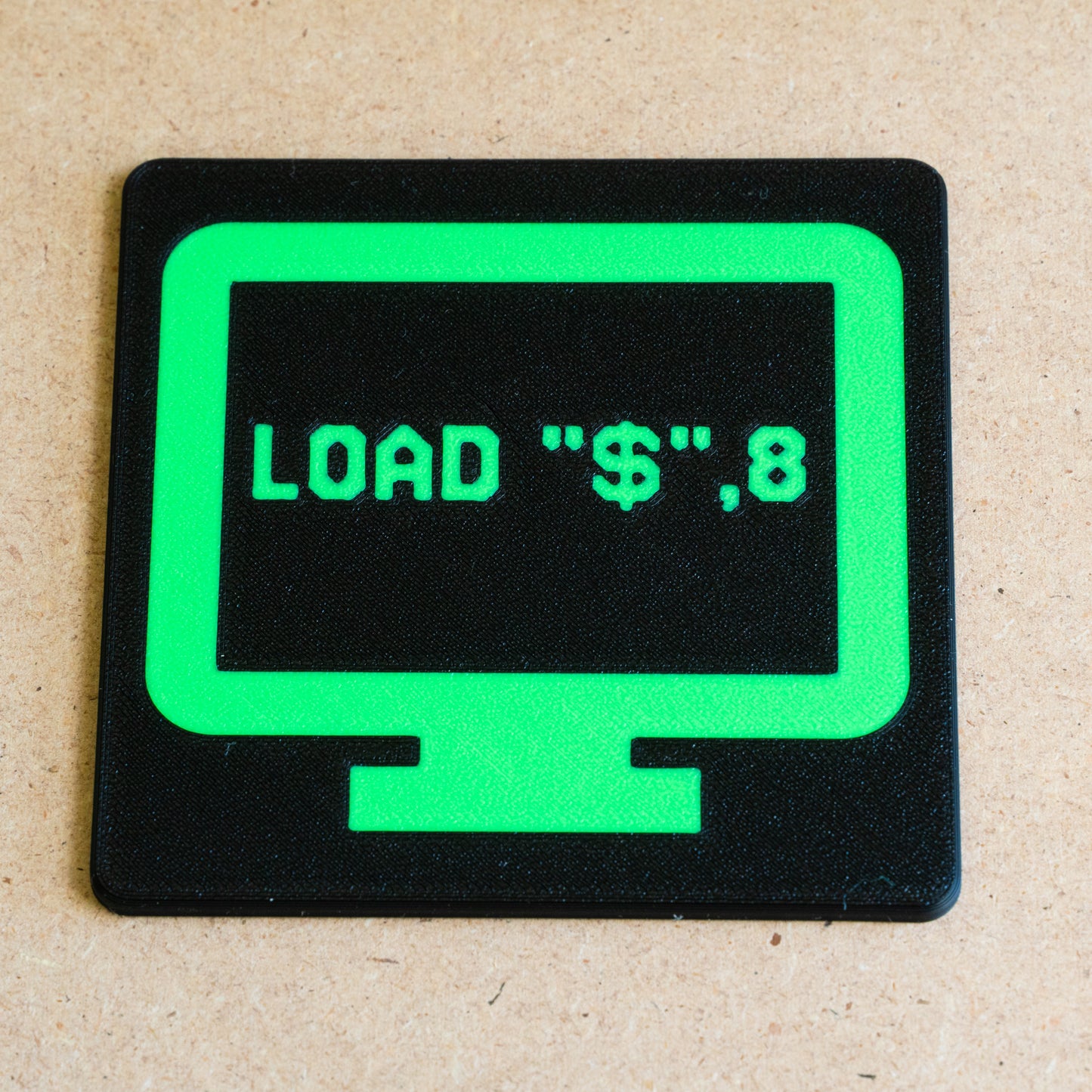 Sottobicchiere multicolore "LOAD "$",8"