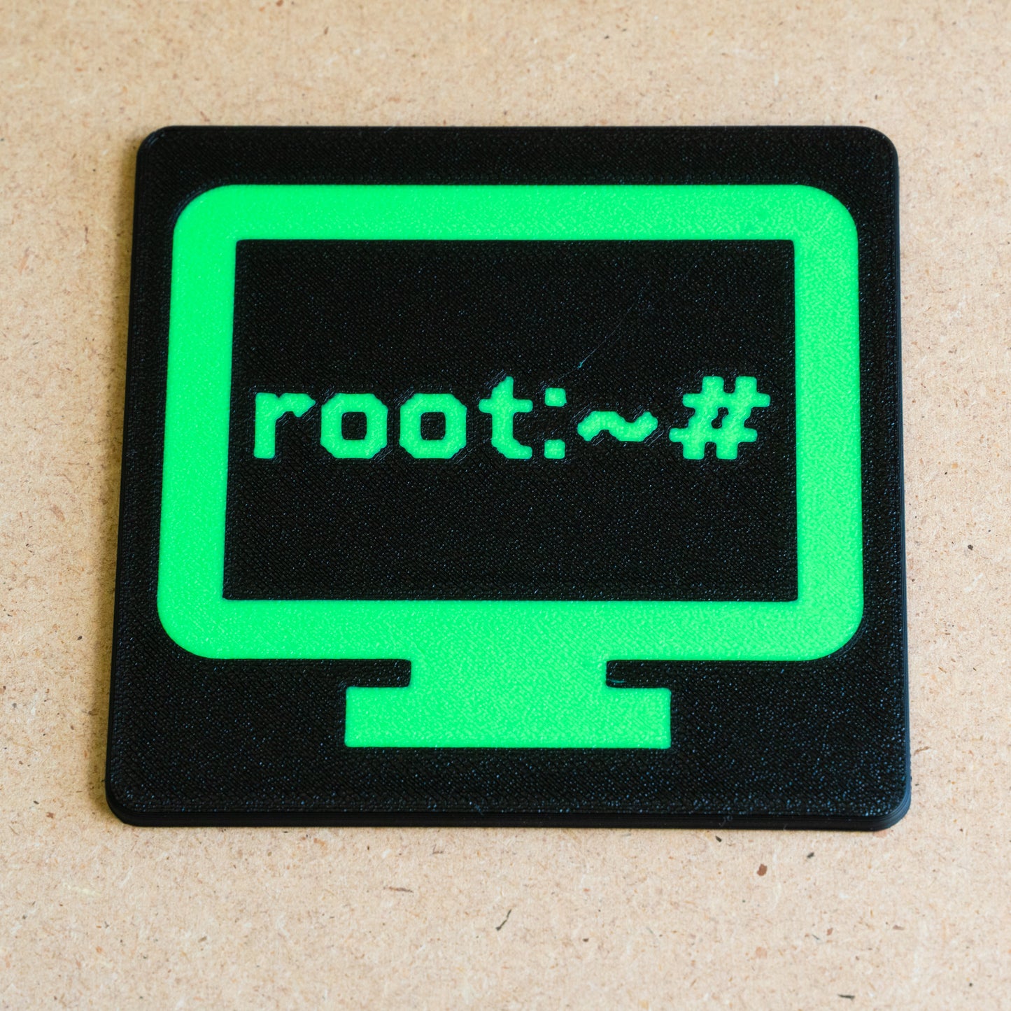 Sottobicchiere multicolore "root:~#"